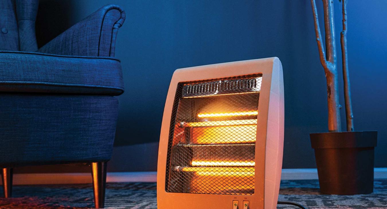 Electric space heater in a blue living room.