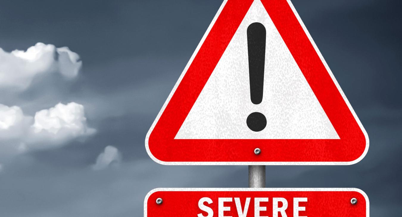 A warning sign which reads severe weather